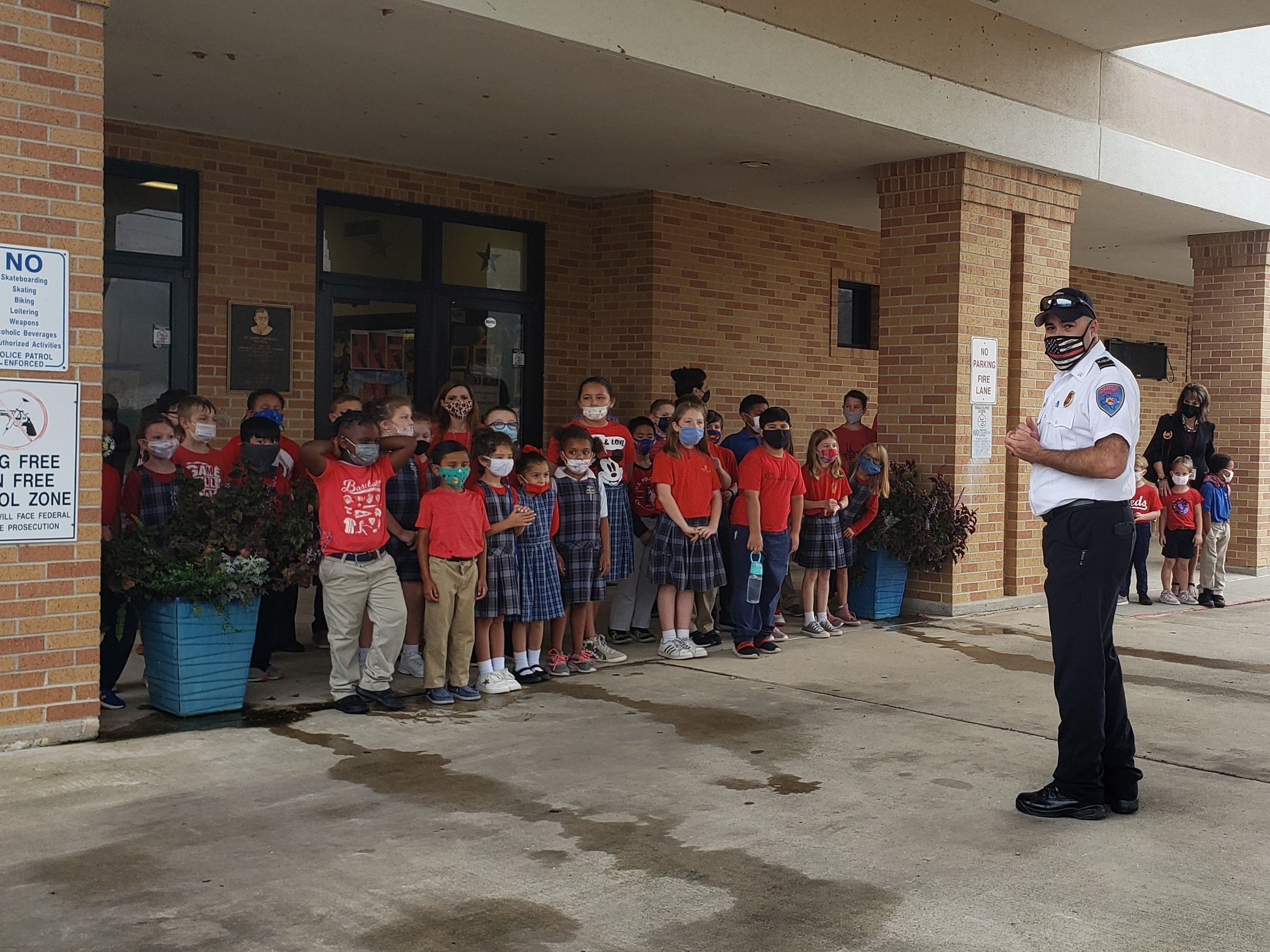 Fire Marshal speaking to the children at St. Mary's